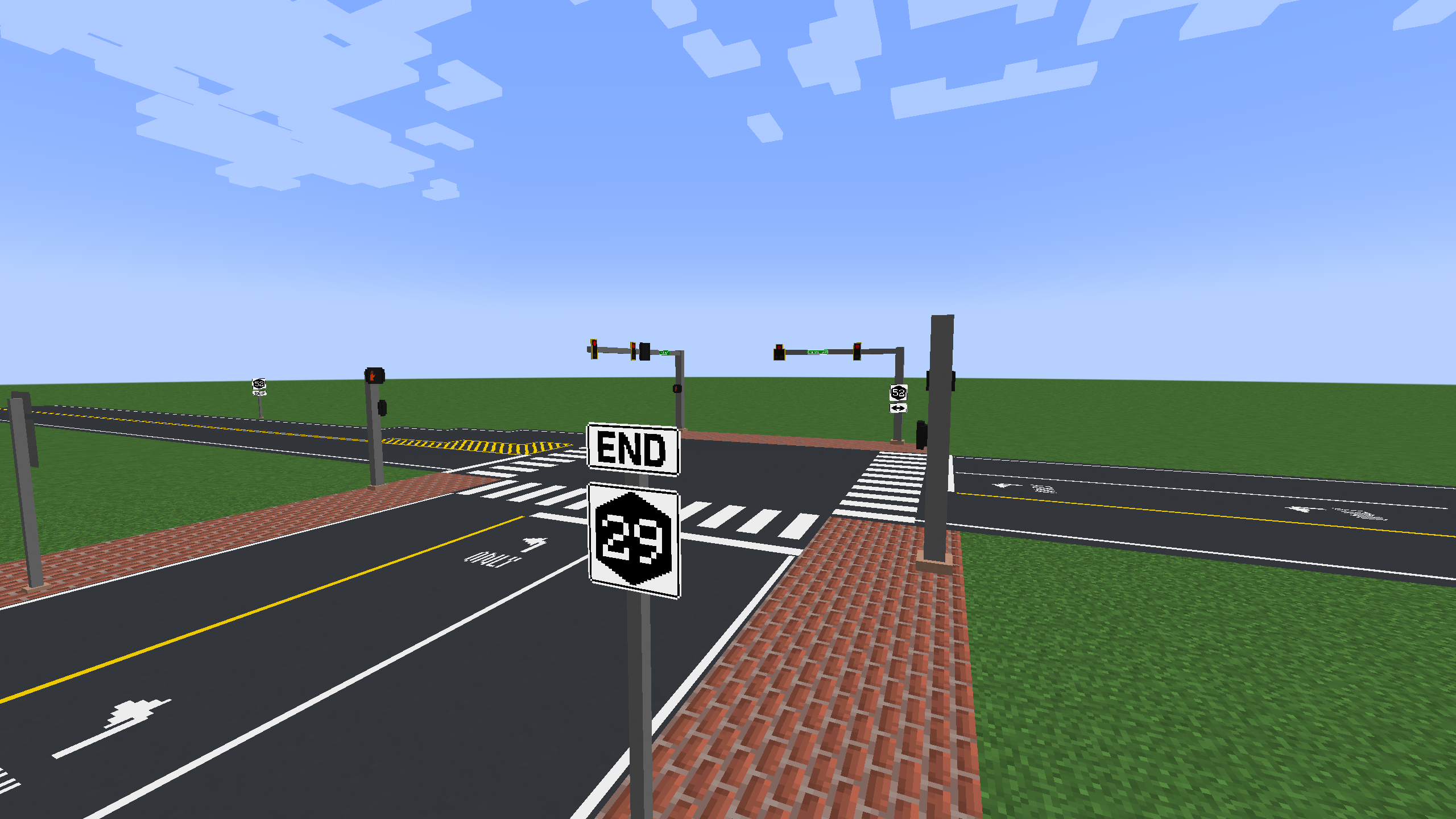 A three-way traffic light controlled intersection, also featuring a "END Route 29" sign.