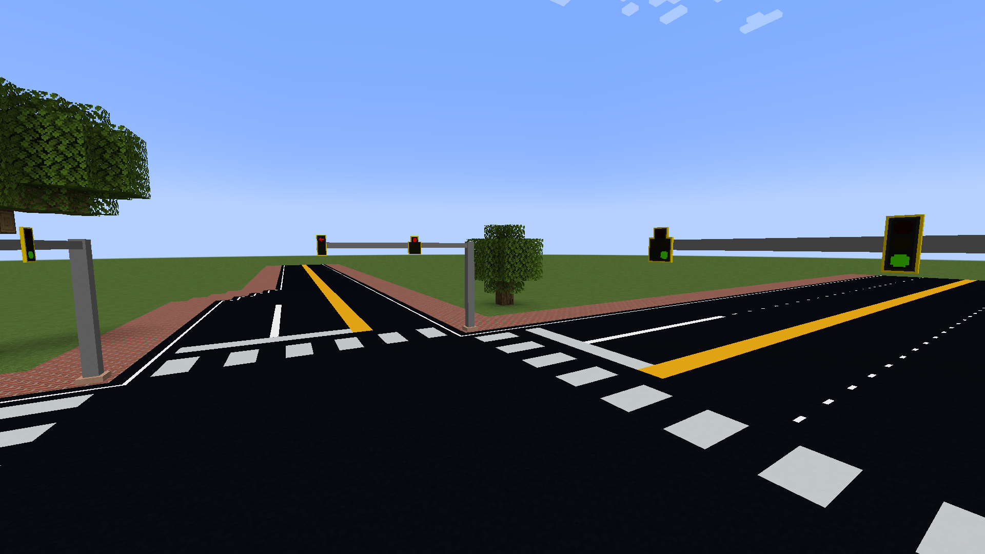 A simple intersection featuring some traffic lights.